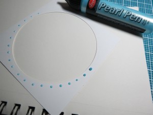 Birthday Scrapbook Pages: adding a circle of pearl dots around the frames.