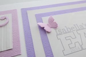 Embellishing Your Scrapbook Pages: Die cut butterfly is scored and bent to create a feeling of movement and secured with glue dot.