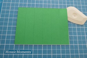 Scrapping with Ease: Cutting Mats: Step 4 Using Mosaic Moments Lil' Chisler helps to lift pieces from the grid.