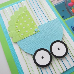 Baby Shower Scrapbook Ideas: foam mounting tape adhered to back of carriage makes this a 3-D piece.