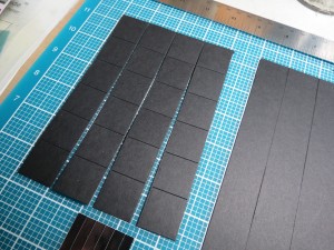 Basketweave: scrapbooking for the guys in your life. Cut your 1" tiles using the die. Cut strips of  ' black cardstock.