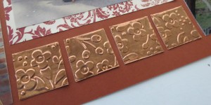 MM Colonial Inspiration copper sheet run through embossing folder by Anna Griffin 